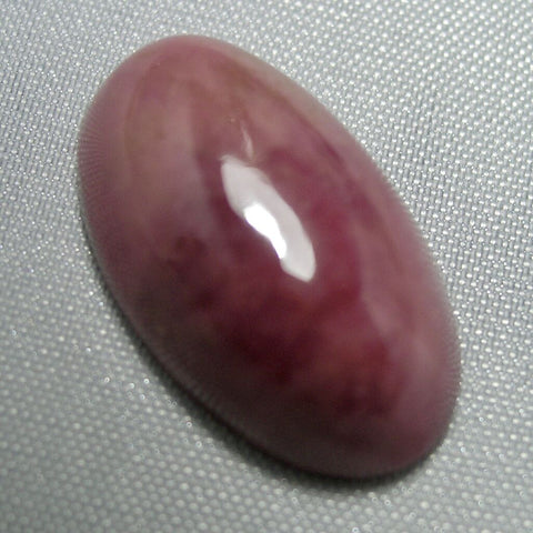 Echter Rhodonit Oval Cabochon 24ct 23x13.7mm